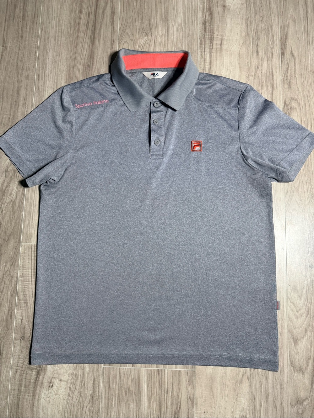 FILA men’s gray polo shirt, size 100.